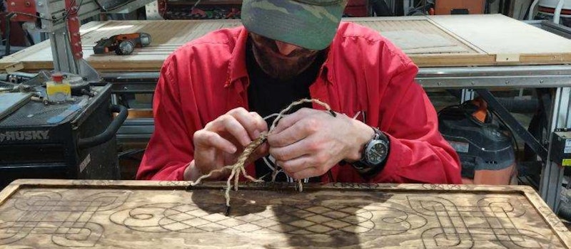 Puzzledaddy working on a puzzle board